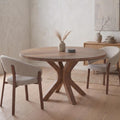Bruine ronde eettafel van mangohout