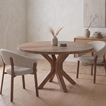 Bruine ronde eettafel van mangohout