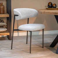 Eetkamerstoel Metz Beige Bouclé stof met zwart onderstel Mahom